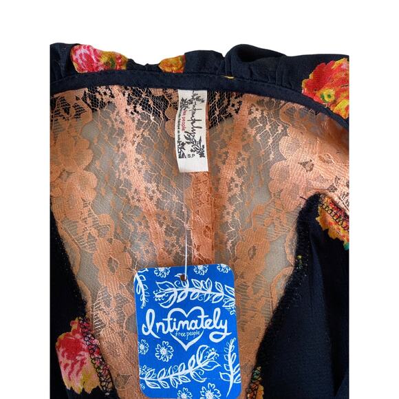 FREE PEOPLE INTIMATELY BLACK FLORAL LONG SLEEVE LACE & RUFFLE SNAP BODY SUIT - Picture 8 of 8